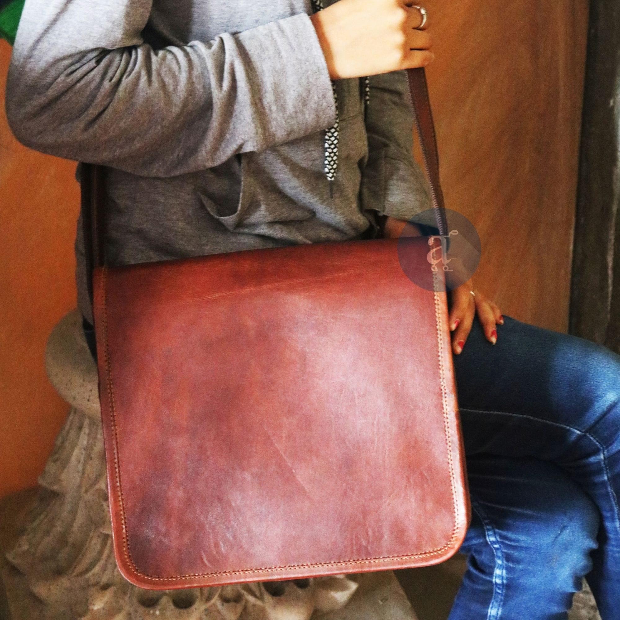 Postman leather online bag